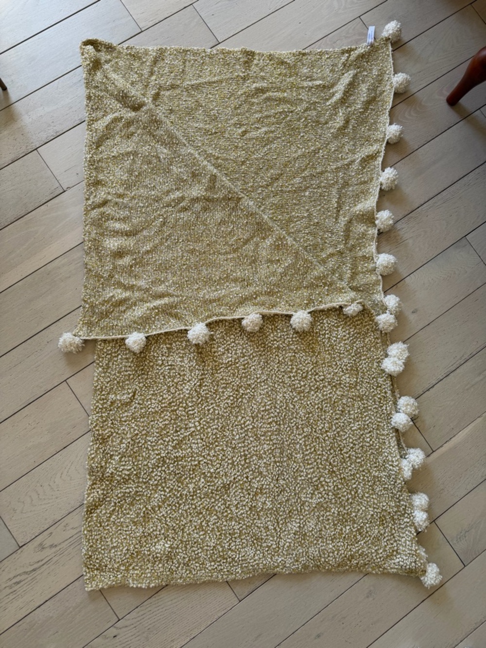 Anthropologie Pom-Pom Textured Throw in glimmering gold
